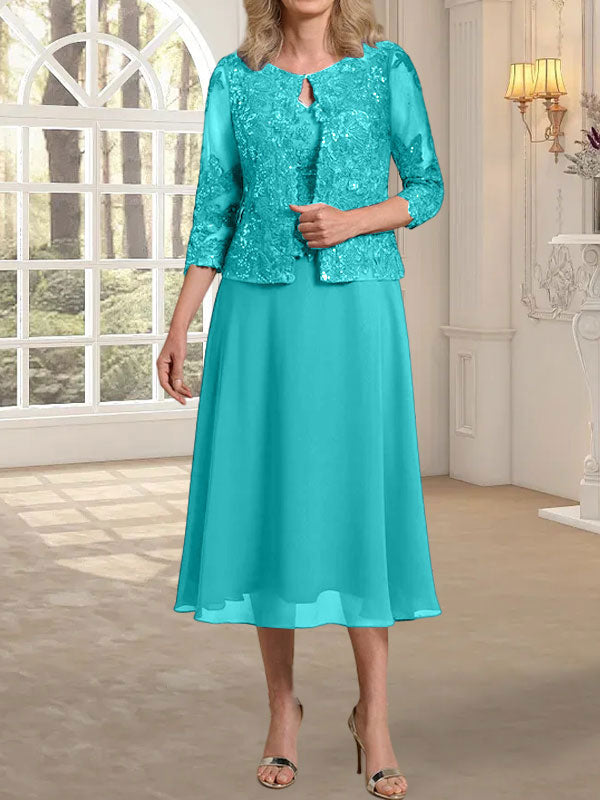 Robe de mère de la mariée en dentelle et mousseline, longueur thé, en ligne A, décolleté arrondi, ornée de paillettes