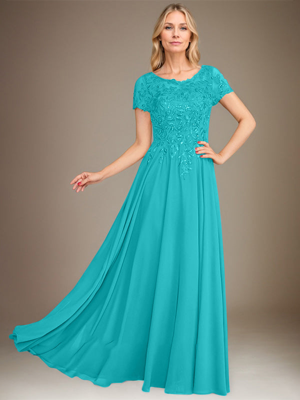 Robe de mère de la mariée en mousseline, longueur au sol, coupe en A, décolleté arrondi, ornée d'appliques et de paillettes