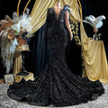 Abito da sera lungo a sirena con maniche lunghe, applicazione di paillettes nere e strass Y8313