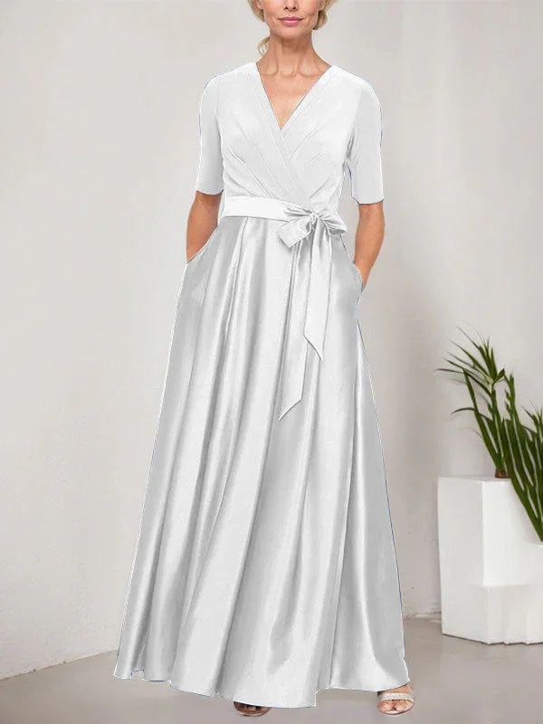 Vestido de baile con escote cruzado, falda completa de satén y cuerpo de jersey