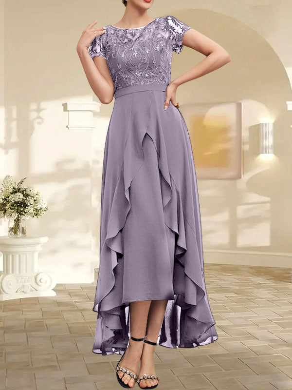Robe de mère de la mariée en mousseline et dentelle asymétrique illusion à encolure dégagée, coupe en A, avec nœud, volants et paillettes