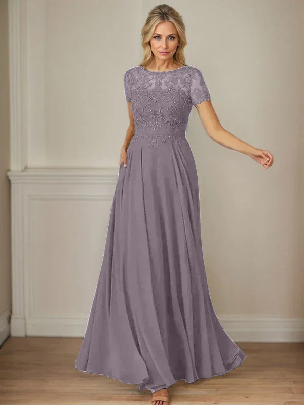 فستان شيفون كحلي داكن برقبة قارب وتطريز بالترتر على شكل حرف A