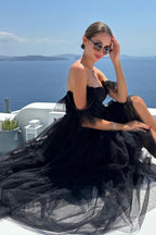 Abito da sera a linea A con corsetto e balze in tulle