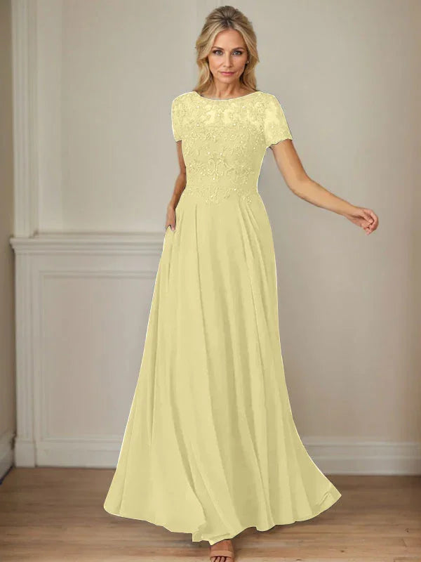 فستان شيفون كحلي داكن برقبة قارب وتطريز بالترتر على شكل حرف A