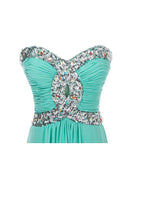 Robe de bal longue en mousseline coupe trapèze ornée de perles de cristal PG250