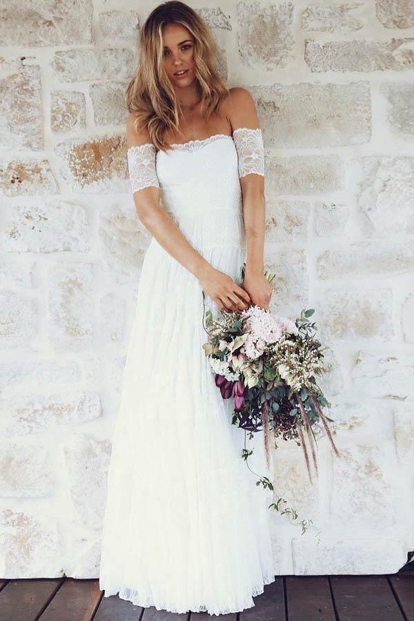 Abito da sposa bohemien con scollo a barca, maniche corte e pizzo a linea ad A