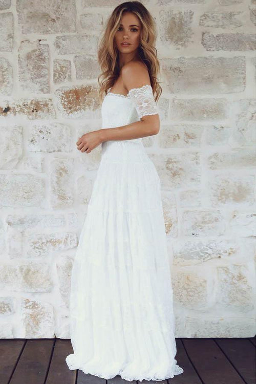 Abito da sposa bohemien con scollo a barca, maniche corte e pizzo a linea ad A