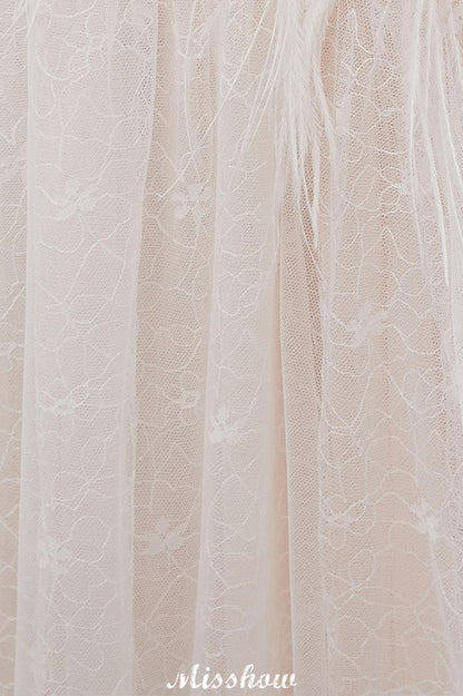 Vestido de novia color marfil con encaje, sin mangas y largo hasta el suelo