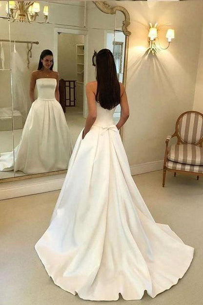 A-Linien-Brautkleid aus Satin in Elfenbein mit offenem Rücken und Taschen