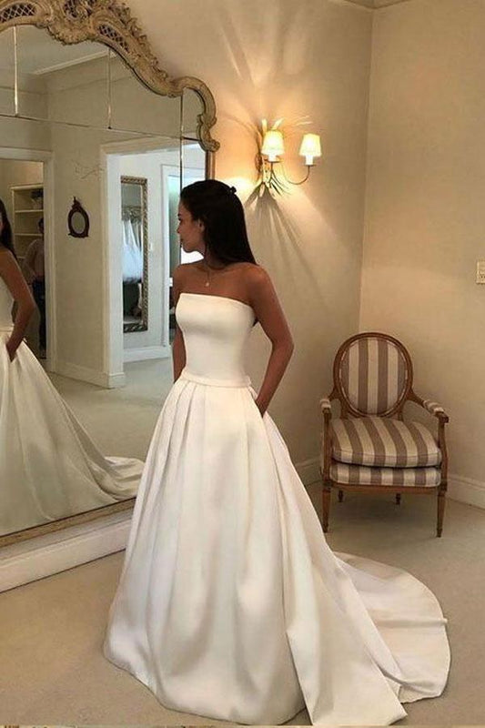 A-Linien-Brautkleid aus Satin in Elfenbein mit offenem Rücken und Taschen