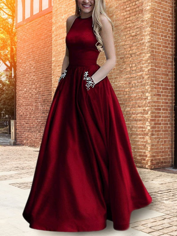 Abito da sera lungo in raso con perline, senza maniche, con collo all'americana, linea a trapezio/elegante