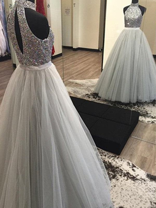 Abito da sera lungo in tulle con perline, senza maniche, con scollo all'americana, linea a trapezio/elegante