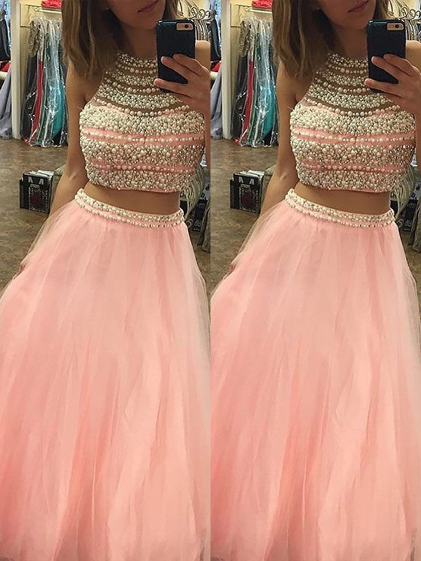 Abito da sera a due pezzi con gonna lunga in tulle, senza maniche, con collo all'americana, linea a A ed eleganti perline