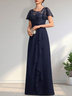 Abito da madre della sposa in pizzo e chiffon con gonna lunga a terra, linea a trapezio asimmetrica, effetto illusione, con balze a cascata e paillettes