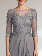 Robe de mère de la mariée en mousseline et dentelle, coupe en A, décolleté en U, longueur au sol, avec perles, paillettes et volants en cascade