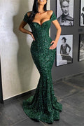 Abito lungo da sera sirena con scollo a cuore, paillettes e balze