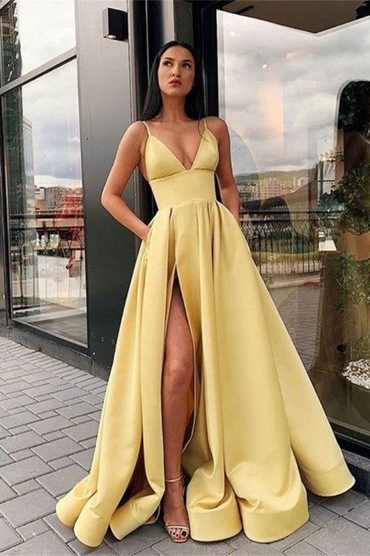 Elegante vestido de fiesta largo de satén con escote en V, abertura frontal y bolsillos.