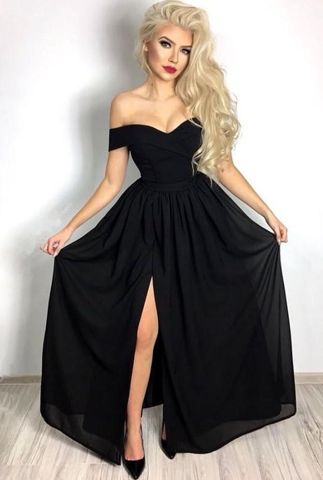 Abito da sera elegante nero mezzanotte con spalle scoperte e balza frontale divisa