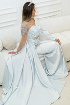 Abito da sera sirena lungo argento con pizzo e perline e maniche lunghe meraviglioso