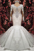 Elegant Sweetheart Mermaid Wedding Dress With Lace Appliques And Beading