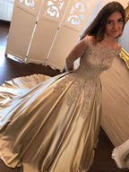 Abito da ballo con maniche lunghe, scollo a spalle scoperte, applicazioni in raso per feste di gala