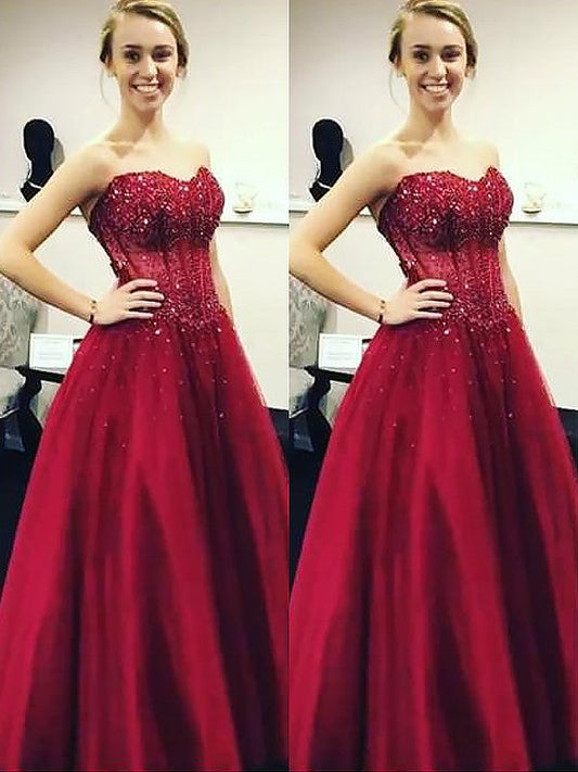 Vestidos de fiesta de satén con escote en forma de corazón, sin mangas y con pedrería hasta el suelo