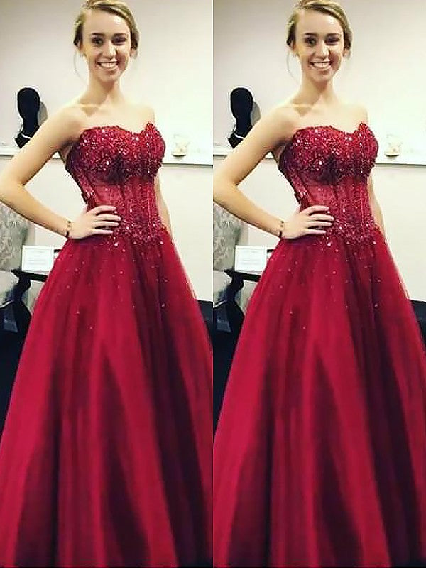 Robe de bal sans manches à décolleté cœur, ornée de perles, longue en satin pour soirée