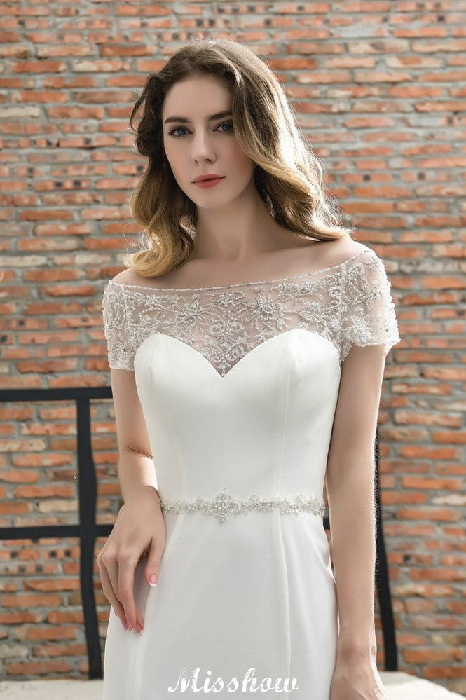 Robe de mariée sirène ajustée à manches courtes en satin avec traîne balayante/trumpet