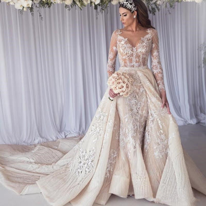 Hermoso vestido de novia de sirena con mangas largas y encaje