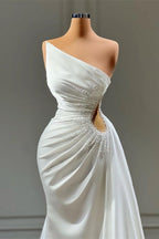 Magnifique robe de mariée blanche longue en ligne A sans manches ornée de perles