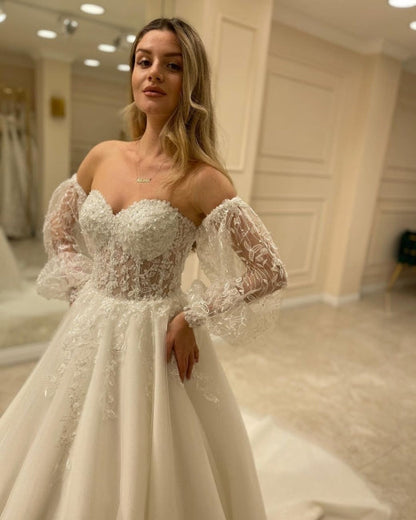 Wunderschöne schulterfreie A-Linien-Brautkleider mit Spitze 