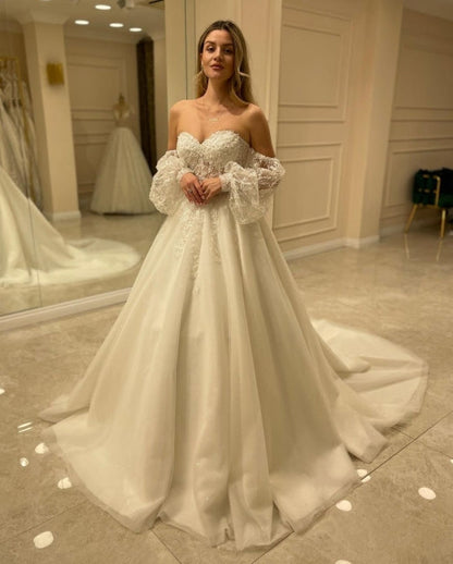 Wunderschöne schulterfreie A-Linien-Brautkleider mit Spitze 