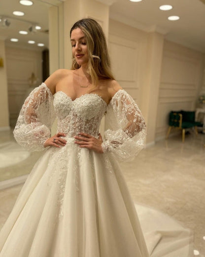 Wunderschöne schulterfreie A-Linien-Brautkleider mit Spitze 
