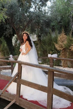 Magnifique robe de mariée en tulle, sans manches, coupe trapèze, longueur au sol, avec traîne de chapelle