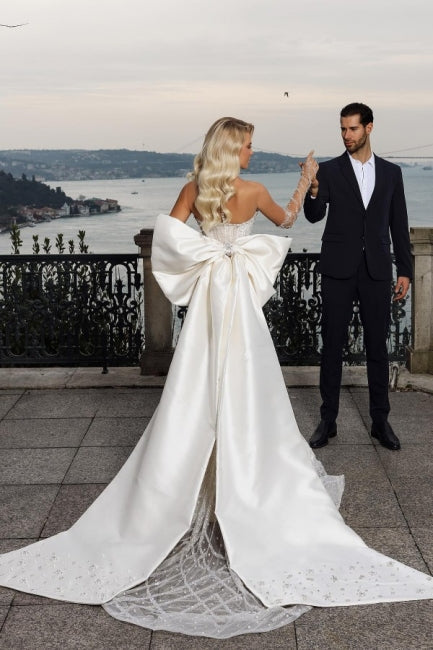 Belle robe de mariée sirène sans bretelles en forme de cœur avec traîne chapelle
