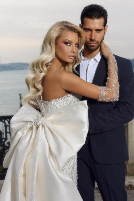 Belle robe de mariée sirène sans bretelles en forme de cœur avec traîne chapelle