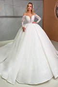 Bellissimo abito da sposa a palloncino con maniche lunghe e perline
