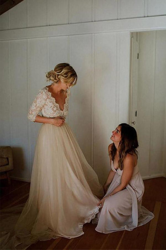 Vestido de novia de corte A con escote en V, media manga y tul con cinturón