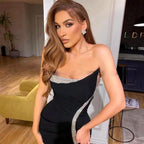 Abito da sera nero elegante senza spalline e senza maniche con spacco alto e paillettes a sirena