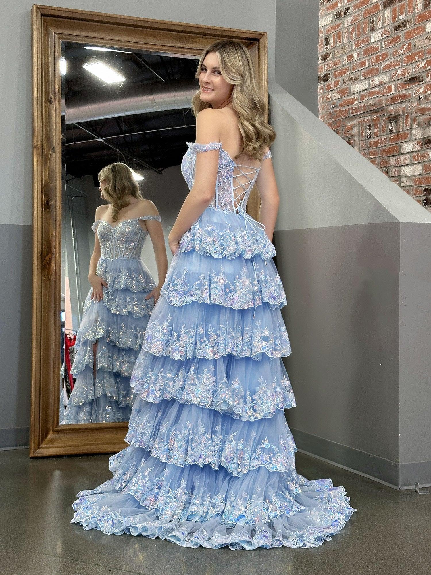 Capri | Abito da sera azzurro con paillettes cristallo, linea a principessa, scollatura a spalle scoperte e balze di pizzo