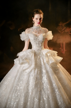Robe de mariée élégante à perles avec jupe en tulle superposée