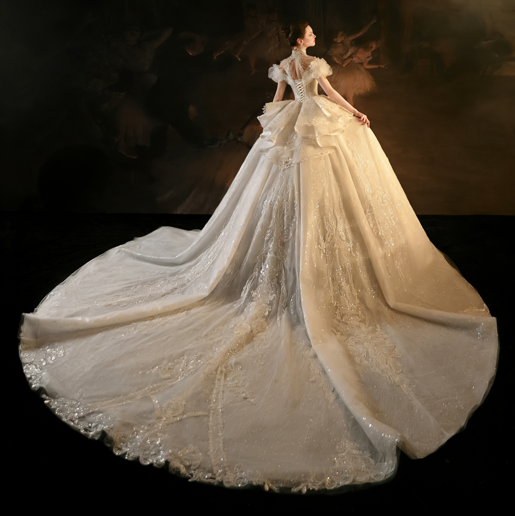 Robe de mariée élégante à perles avec jupe en tulle superposée