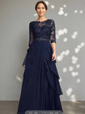 Abito da sera in pizzo con paillettes blu marina