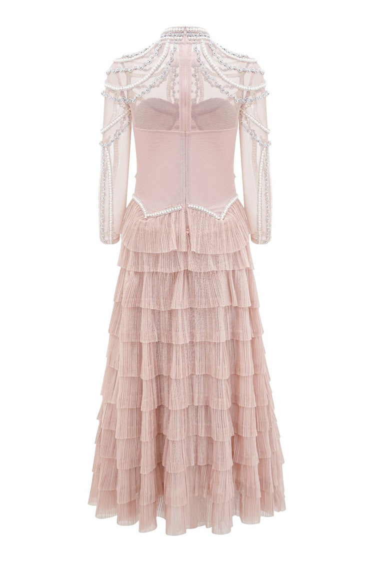 Abito da sera lungo in tulle a goccia con perle di cristallo e vita cadente a balze