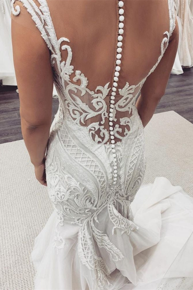 Vestido de novia de sirena con mangas cortas y encaje