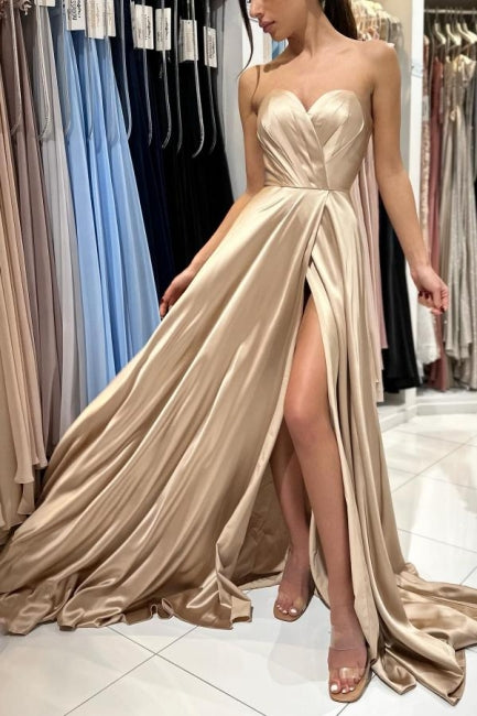 Abiti da sera lunghi senza maniche in raso semplice color champagne con spacco