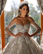 Vestido de novia encantador de encaje con escote en forma de A y mangas largas hasta el suelo