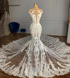 Abito da sposa senza maniche a sirena in tulle con applicazioni, incantevole come un giardino di gioielli
