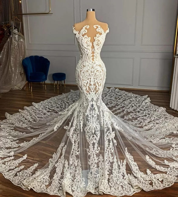 Abito da sposa senza maniche a sirena in tulle con applicazioni, incantevole come un giardino di gioielli