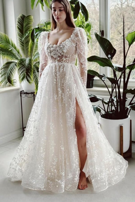 Robe de mariée longue ivoire charmante en ligne A avec manches longues en dentelle et fente